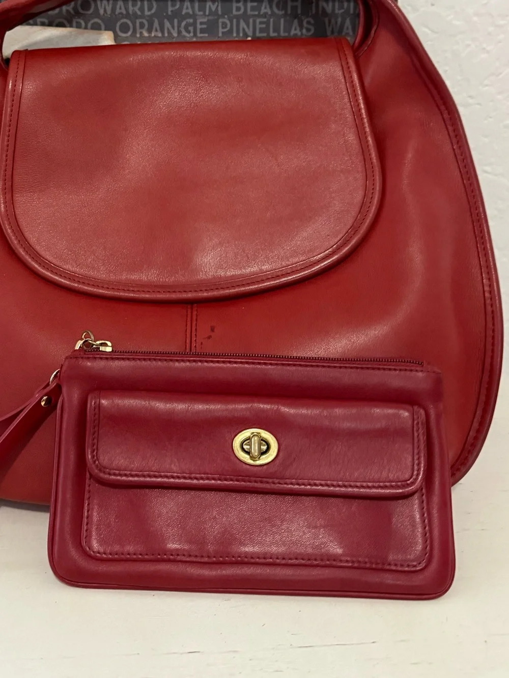 Vintage rare red leather Coach wristlet with brass hardware